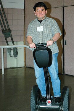 Ian Lee test driving a Segway